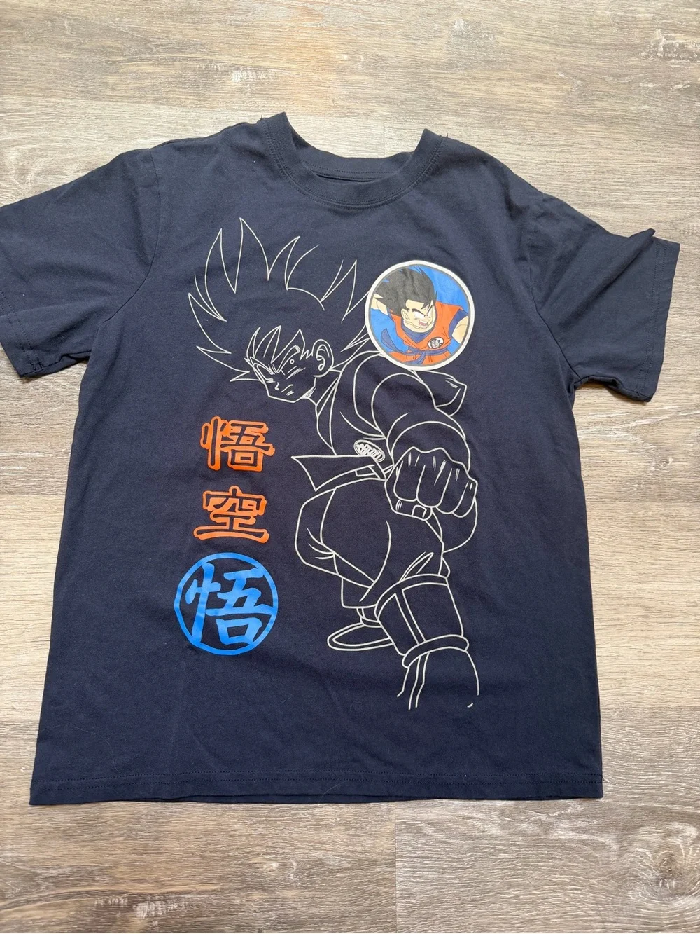 Kids Black Anime Graphic Tee with Orange & Blue Accents